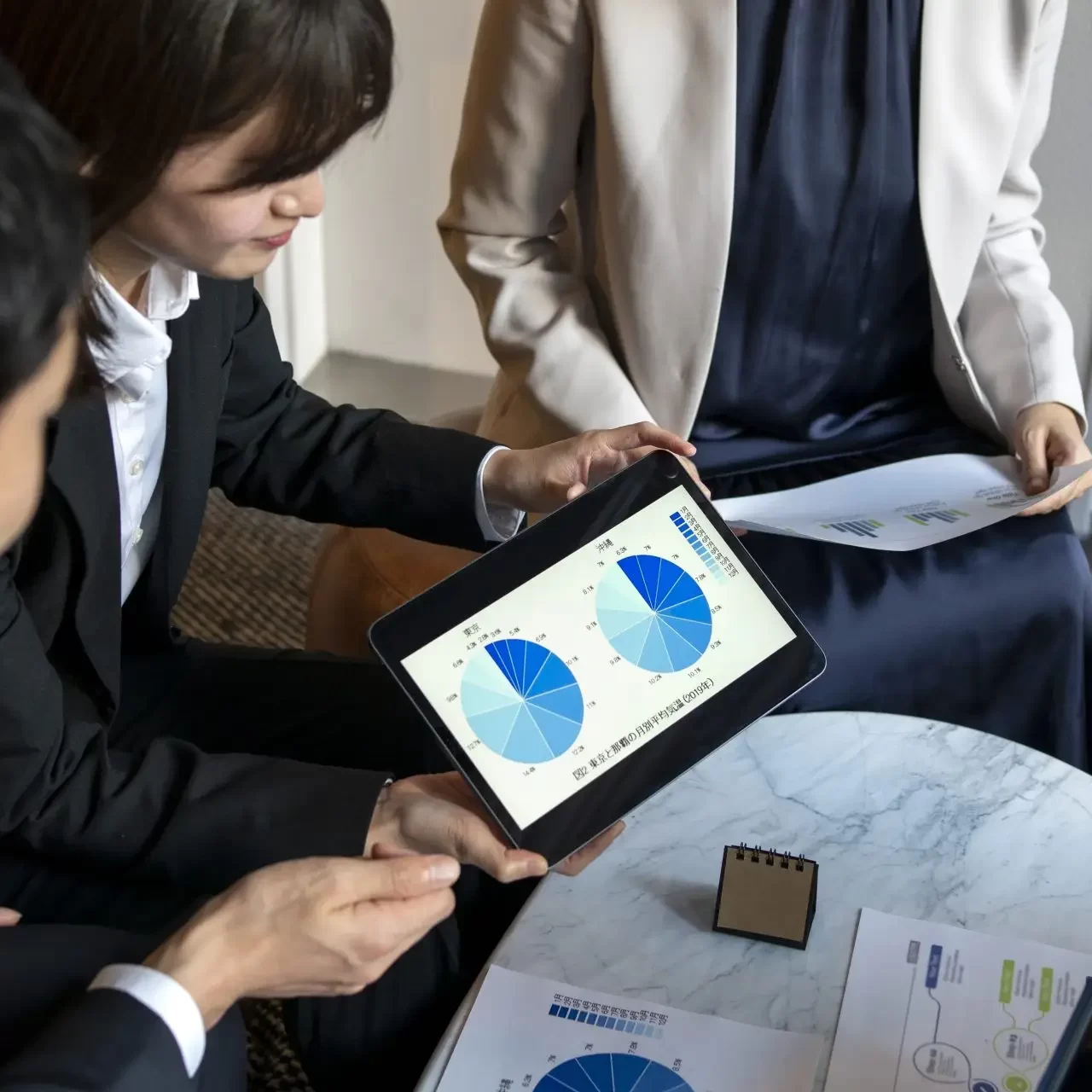 business-people-working-with-ipad-side-view