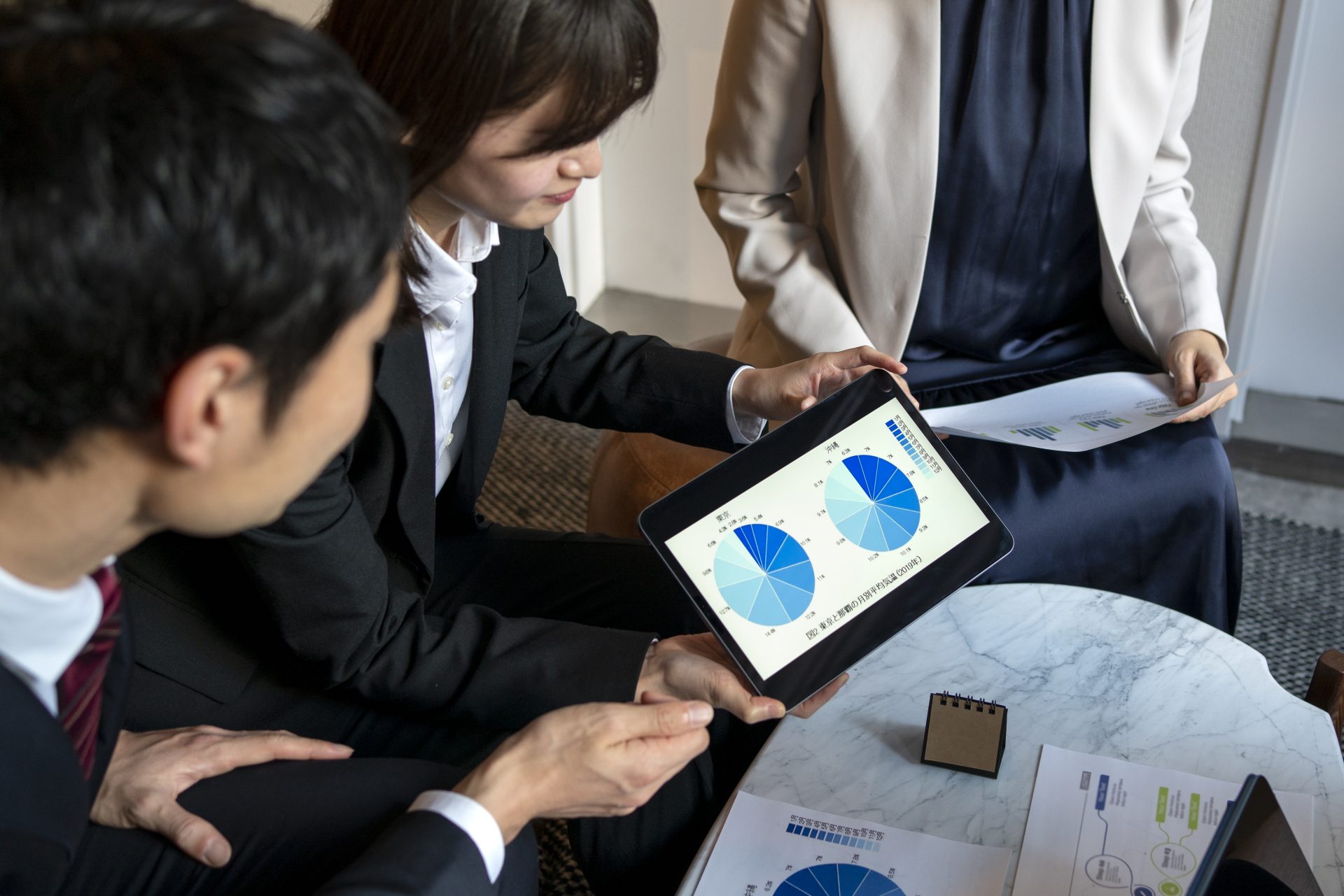 business-people-working-with-ipad-side-view