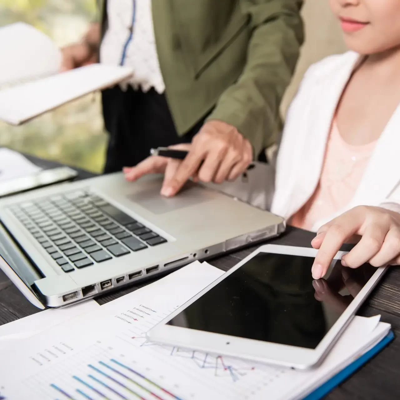 business-team-meeting-discuss-statistical-data-presented-form-digital-graphs-charts