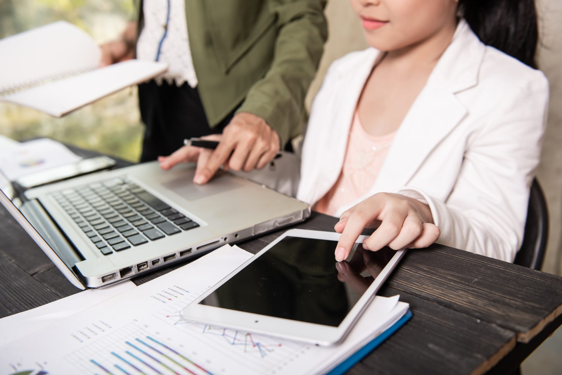 business-team-meeting-discuss-statistical-data-presented-form-digital-graphs-charts