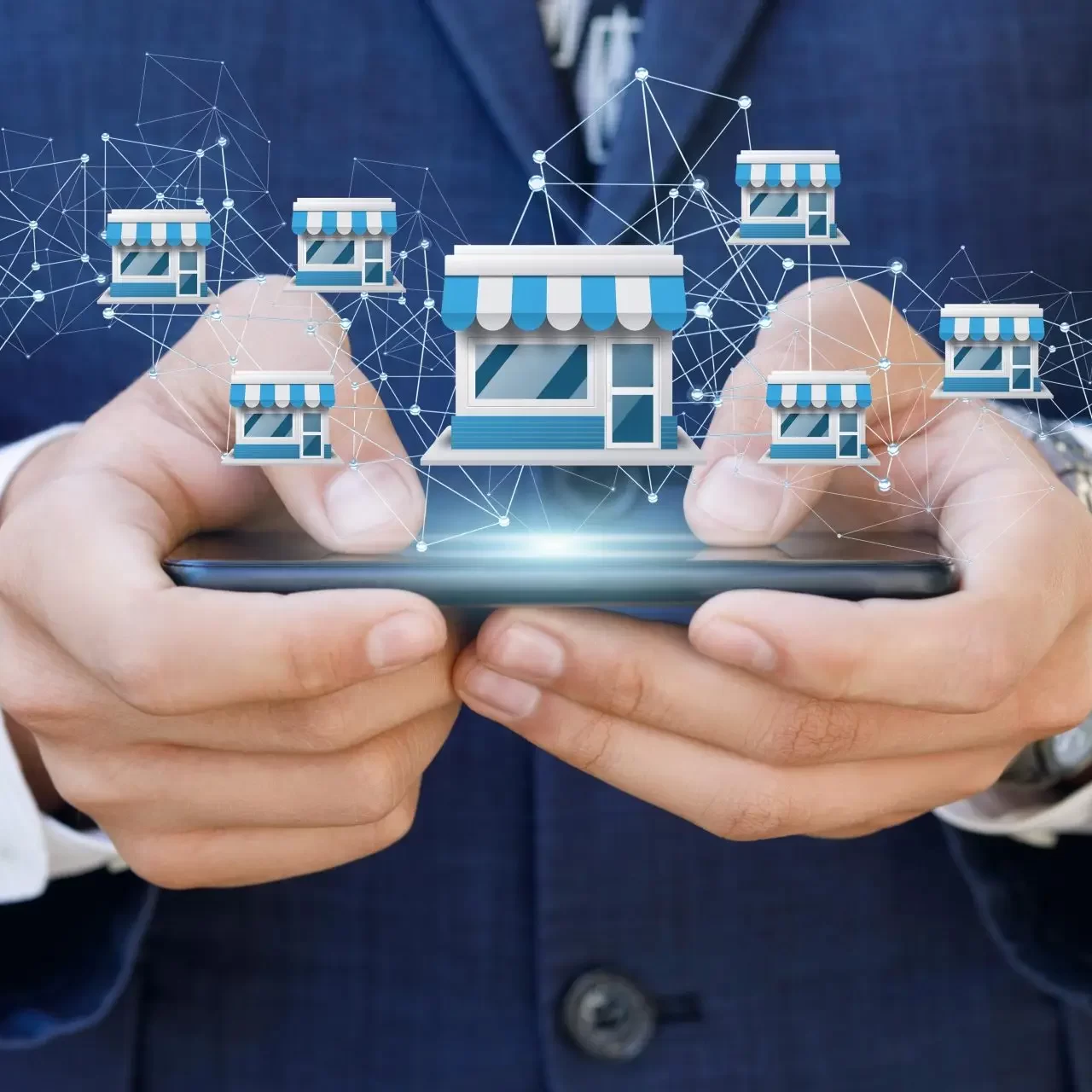 businessman-showing-franchise-system-mobile-device