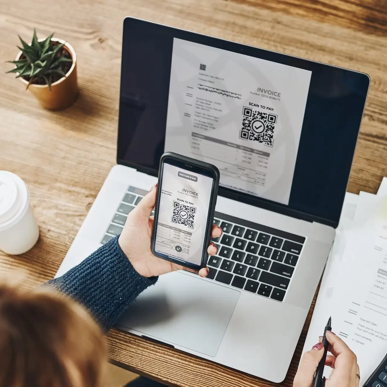 woman-scanning-qr-code-from-invoice-make-payment-using-fast-secure-payment-system-smartphone